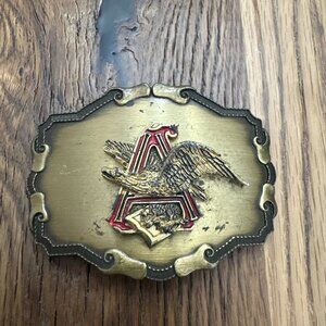 Raintree Vintage 1977 metal belt buckle Anheauser Busch flawed* logo Beer